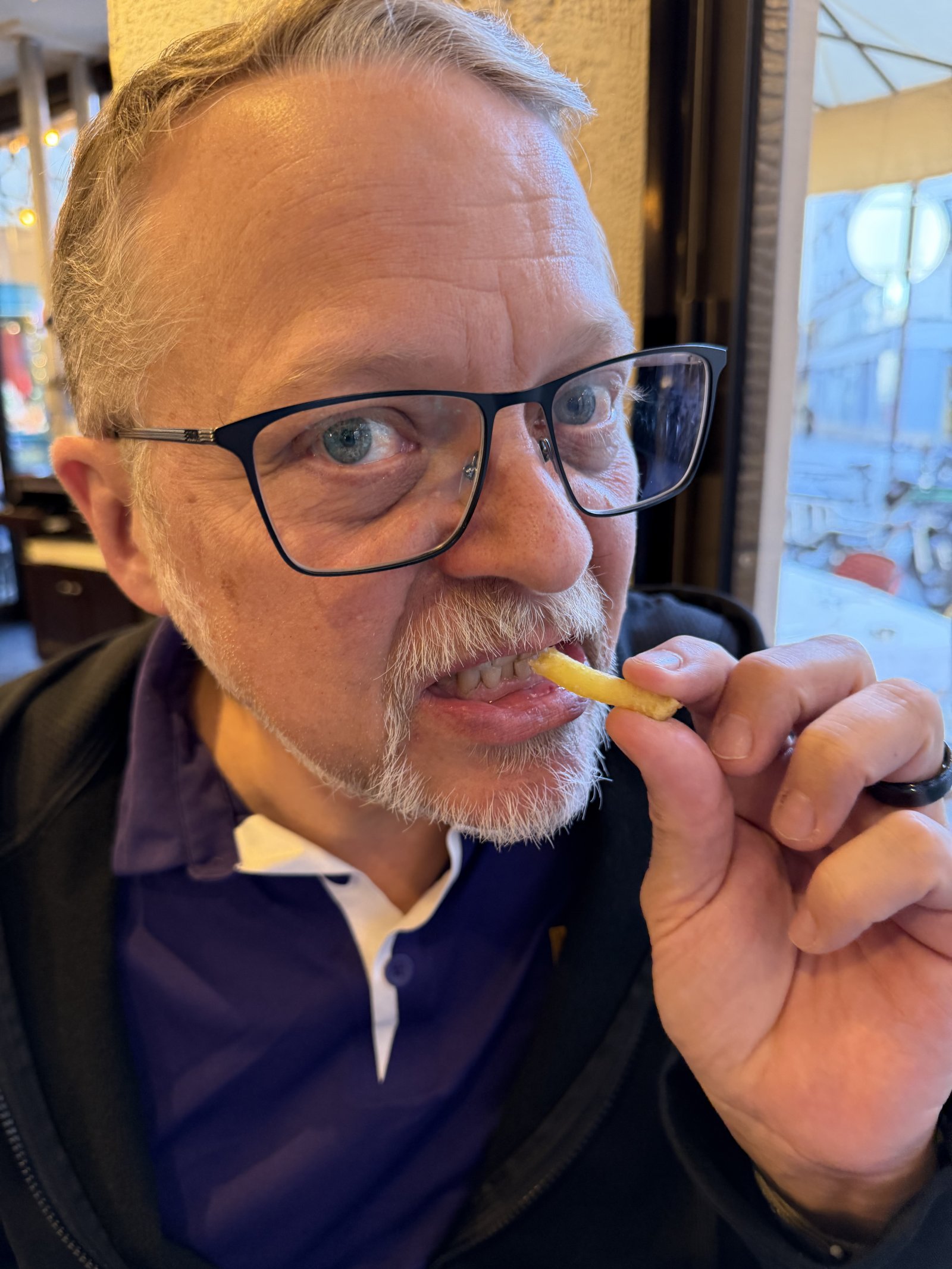 Richard eating his first French fry